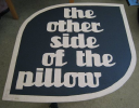 the other side of the pillow Logo